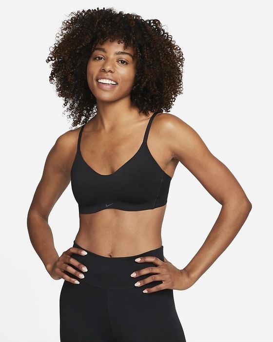 Image of model wearing black bra