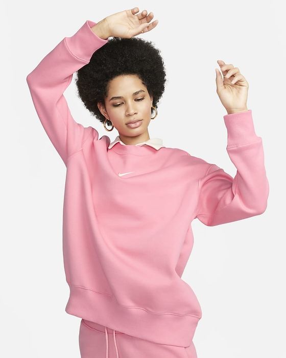 Image of model wearing pink sweatshirt