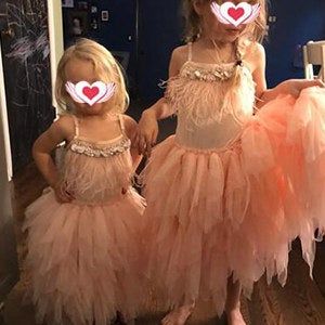 A photo from the reviewer showing two children in dusty pink tutu dresses.