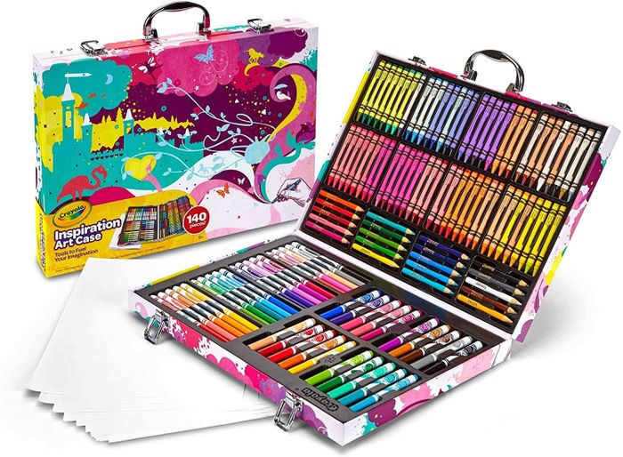 A colorful briefcase opened to reveal an assortment of Crayola crayons, markers, and colored pencils