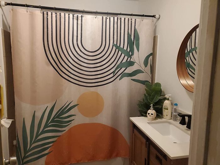 The minimalist shower curtain featuring a sunset design.