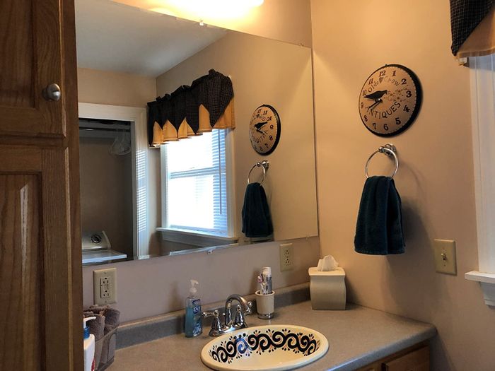 A spotless bathroom mirror from a reviewer