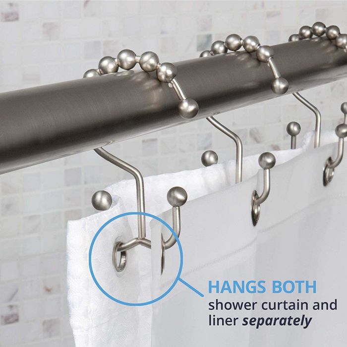 A close-up view of the product showing how the two hooks at the bottom can hold separate items, with the text 