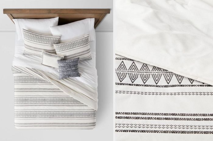 A white and black striped boho woven comforter set with white sheets and matching pillows, placed on a brown wooden bedframe. A close-up of the material reveals an all-white underside.