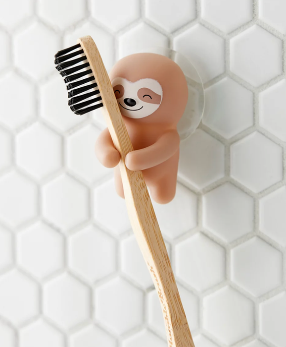 The sloth toothbrush holder.