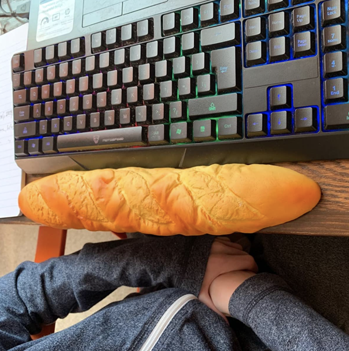 reviewer's photo of the baguette-shaped wrist rest