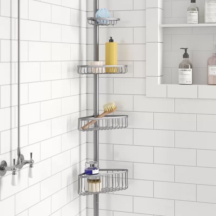 A four-shelf tension pole shower caddy
