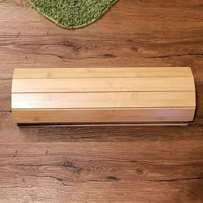 A photo from the same reviewer depicting the bath mat rolled up.