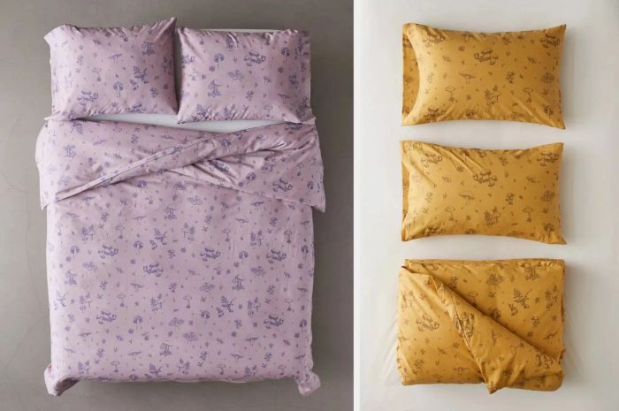 Purple mushroom-patterned duvet cover resting on top of white sheets with matching pillowcases, the product in mustard folded on a white background with accompanying pillowcases.