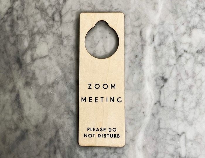 Door sign displaying the message "Zoom Meeting - Please Do Not Disturb"
