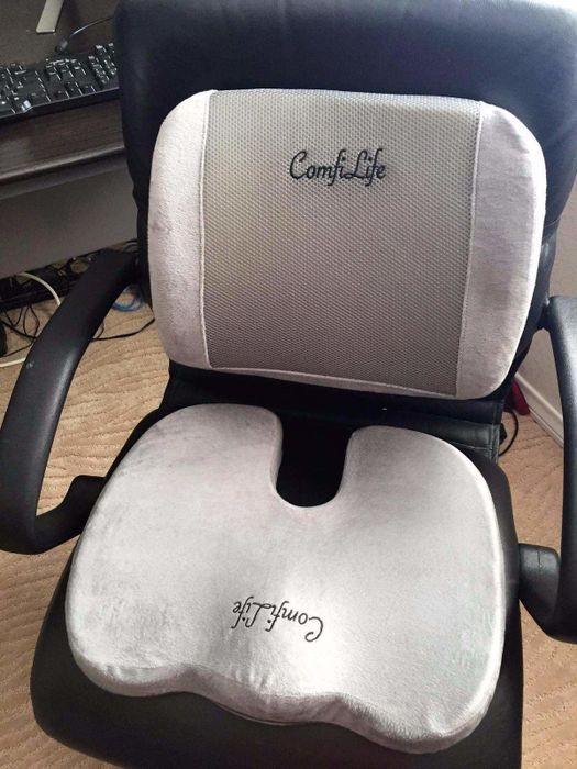 Reviewer photo of the lumbar pillow and cushion placed on a chair