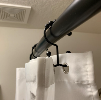 Another angle showcasing the shower rod in place.