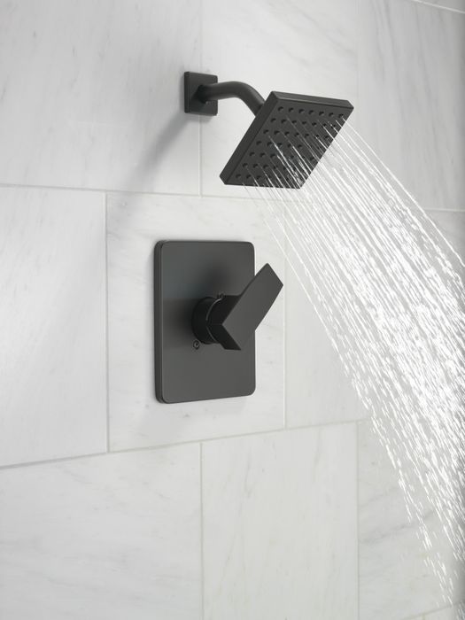 the matte black shower faucet and its handle