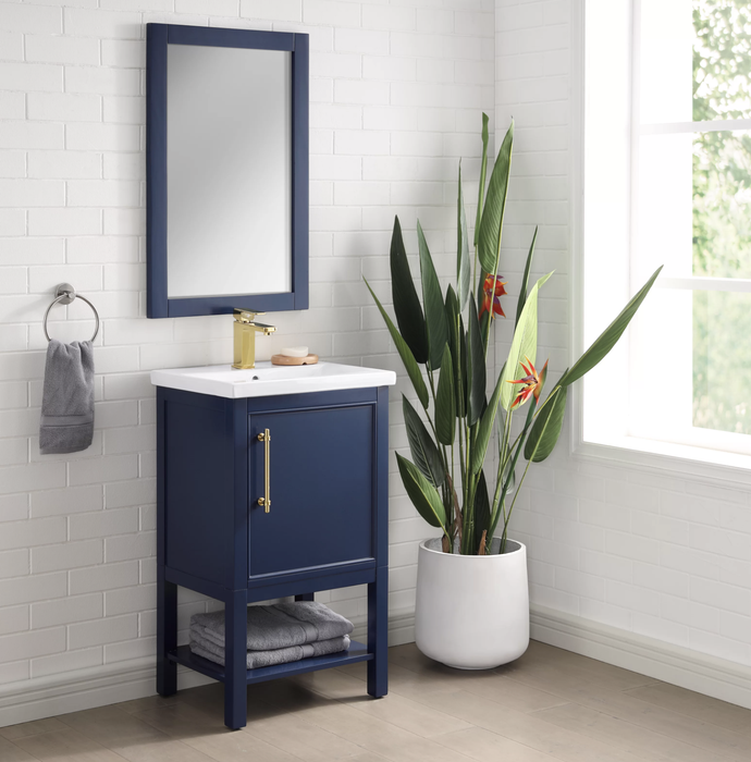 A navy blue bathroom vanity set with luxurious gold accents.