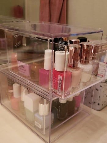 The boxes filled with a collection of nail polishes