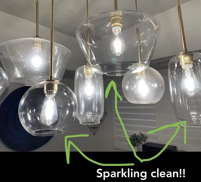 A reviewer’s image showing three dirty ceiling lights and three clean ones, with text