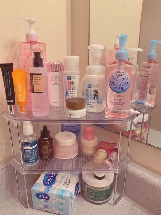 A photo of the shelves stacked neatly, showcasing a variety of bathroom essentials placed on them.