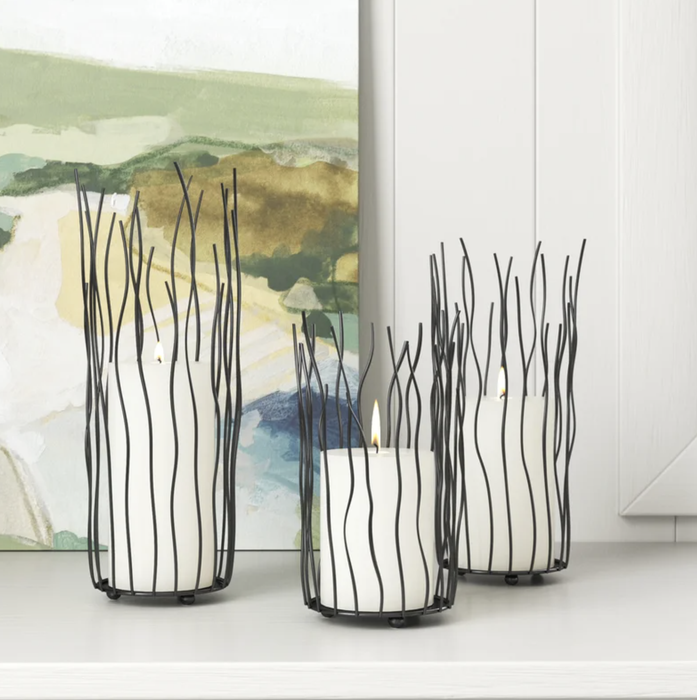 The three wire-framed candle holders