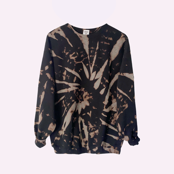 A black and light brown tie-dye sweatshirt