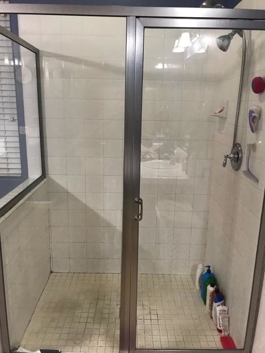 The same shower door, now spotless, after using Rain-X cleaner