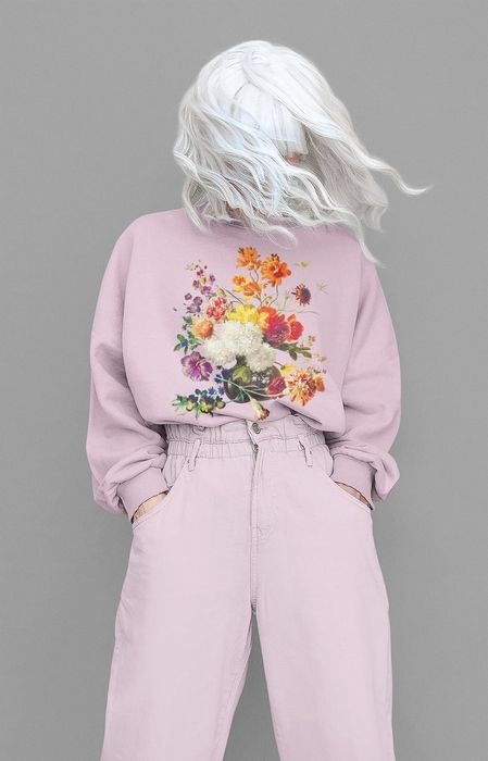 Model showcasing the purple floral sweatshirt