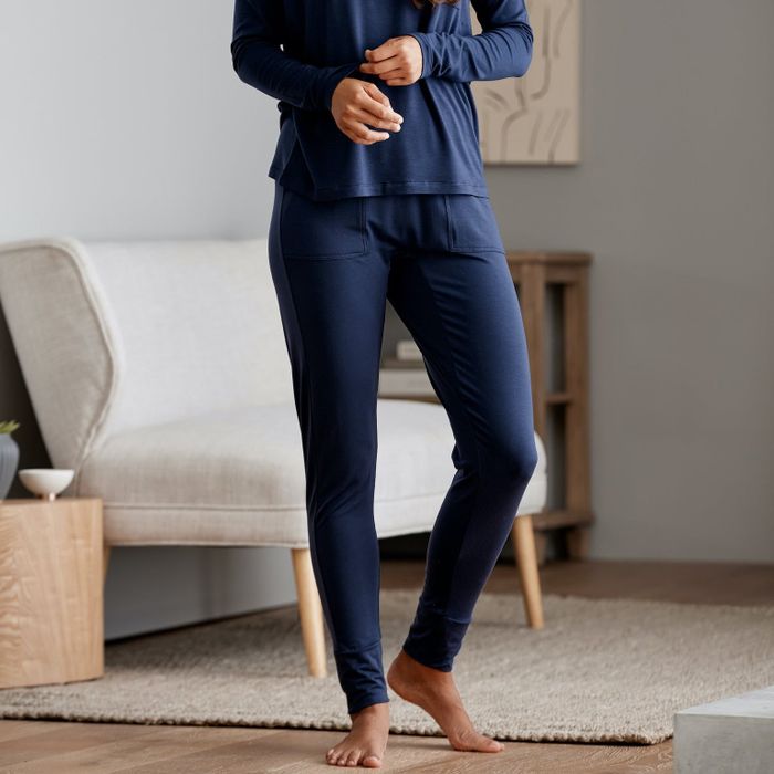 a model wearing blue stretchy joggers