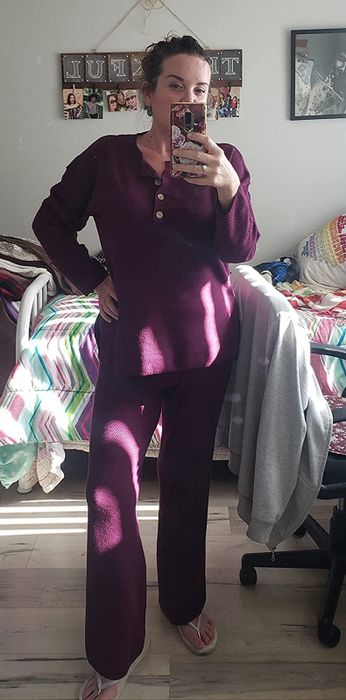 reviewer wearing the lounge set in purple