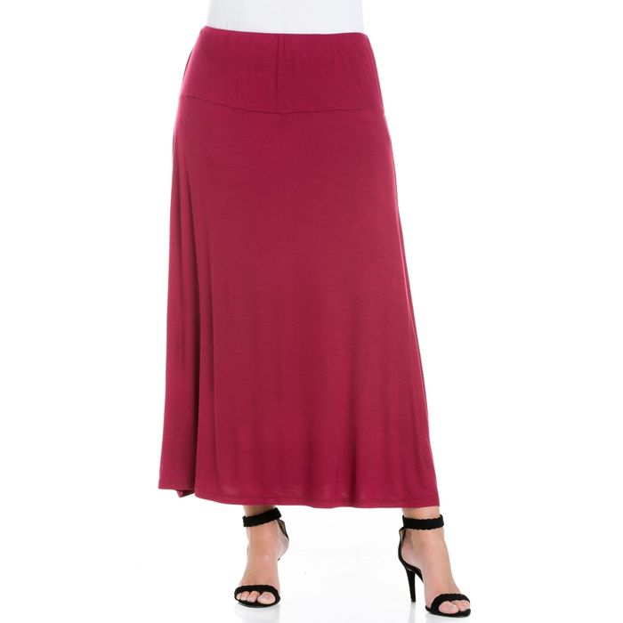 A long skirt with an elastic waistband, paired with black high-heeled sandals, ideal for a fashion-focused shopping article.