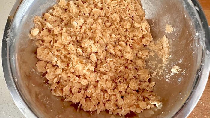 Oat crisp topping in a bowl.