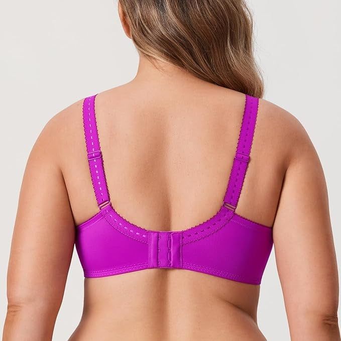 A person wearing a neon purple adjustable and supportive bra, viewed from the back.