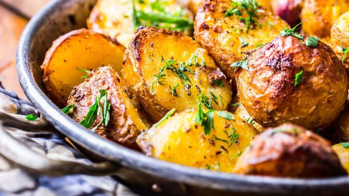 Repurpose your potato salad leftovers by roasting them instead of serving the same dish again.