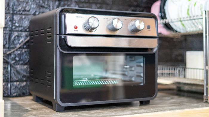 An air fryer oven resting on the countertop.
