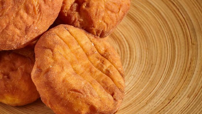 A Fastnacht fritter served on a plate