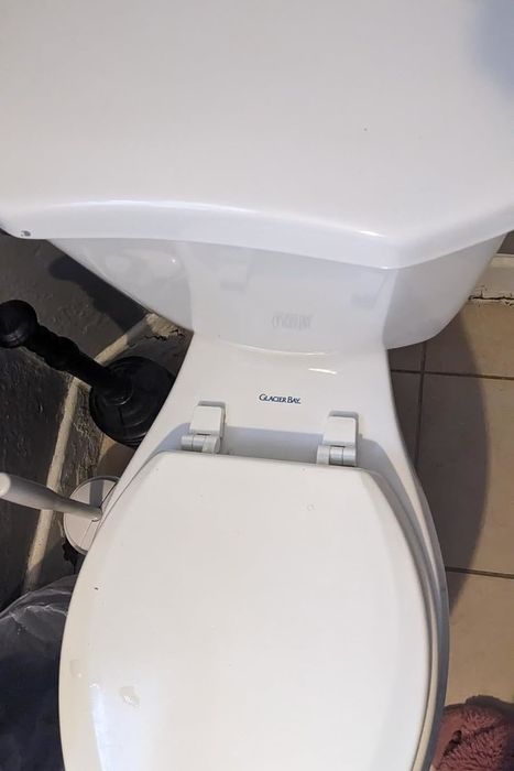 The same toilet, now spotless