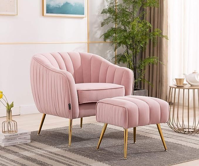 The pink velvet armchair and ottoman placed in a stylish living room.