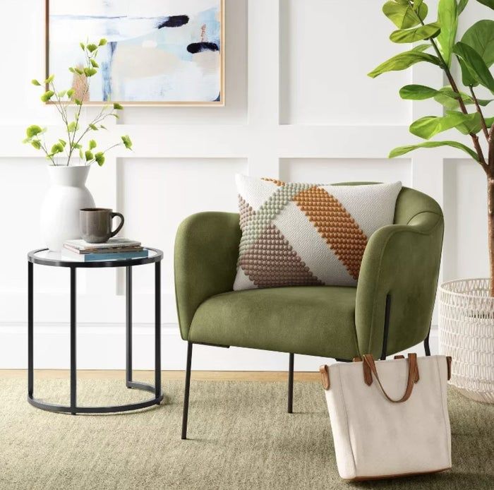 An olive green accent chair