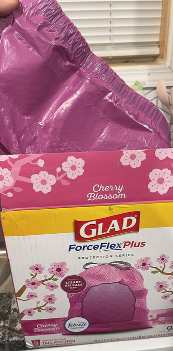 A photo from the reviewer showing the packaging and the trash bag.