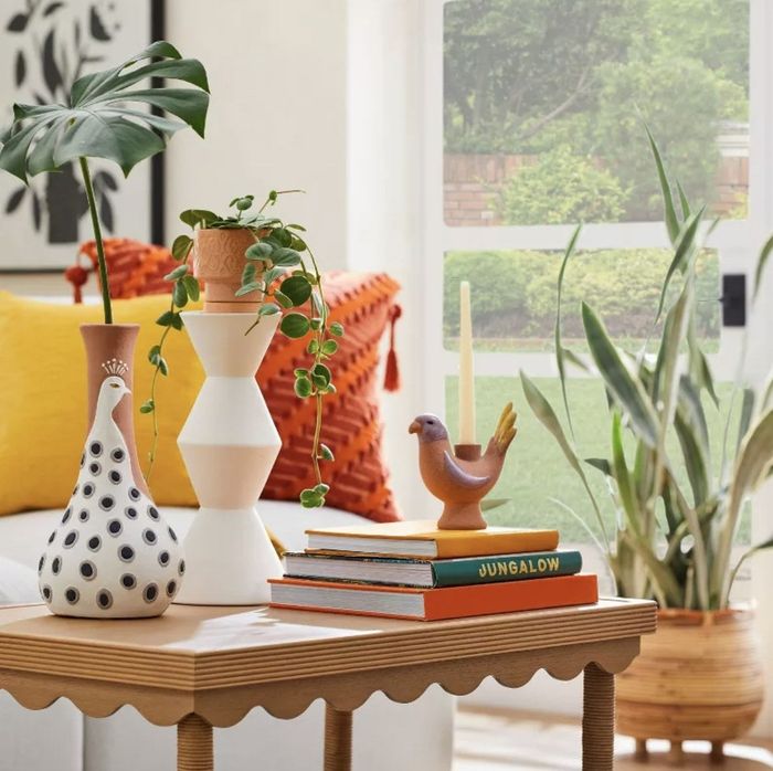 A peacock vase in a living room
