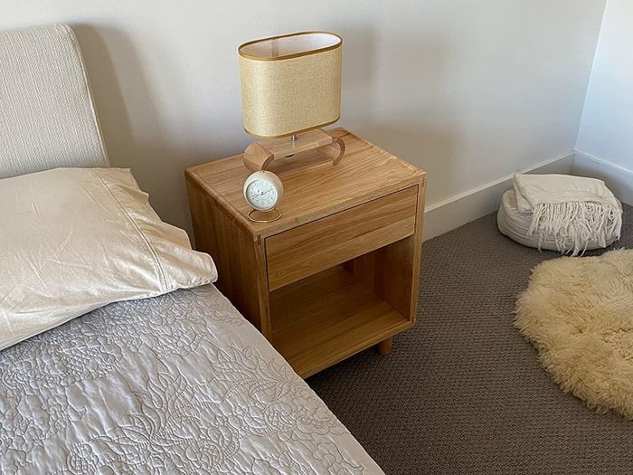 A reviewer’s clock displayed on a bedroom nightstand.