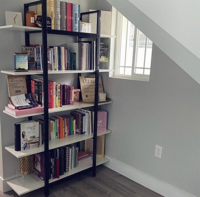 A reviewer's photo showcasing their bookshelf
