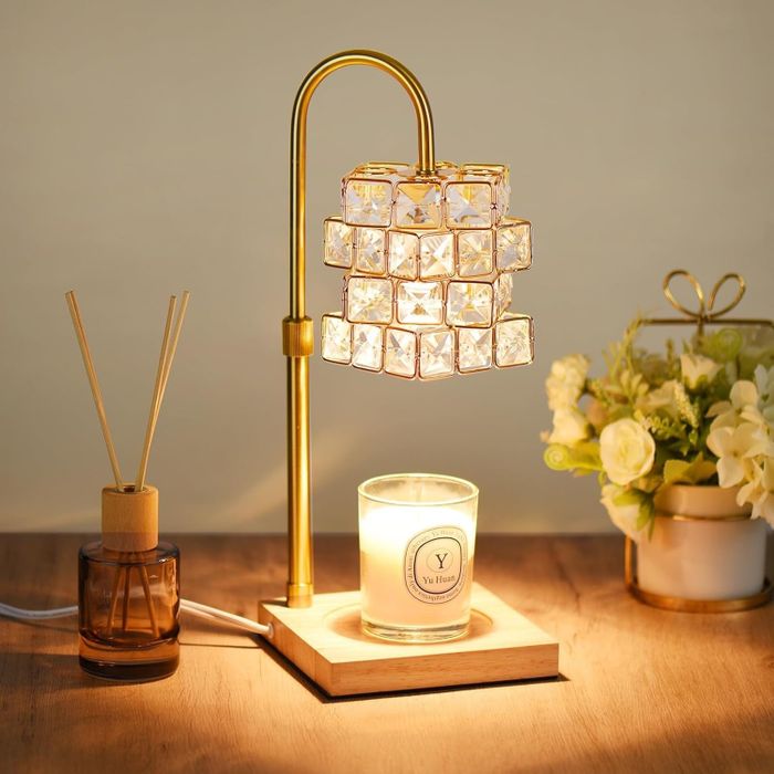 A crystal candle warmer positioned on a table, exuding elegance
