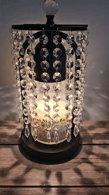 A reviewer's candle warmer placed on a table