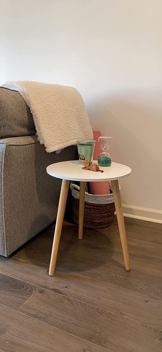 A reviewer's photo of the white side table