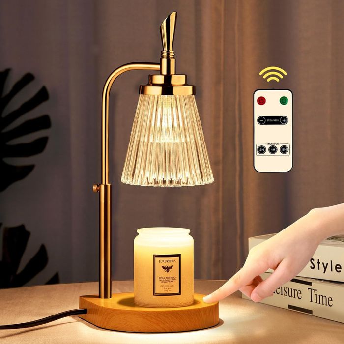 A model pressing the power button on a candle warmer