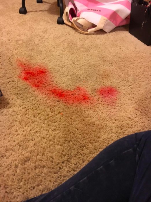 before: a large, hot pink liquid lipstick stain on beige carpet