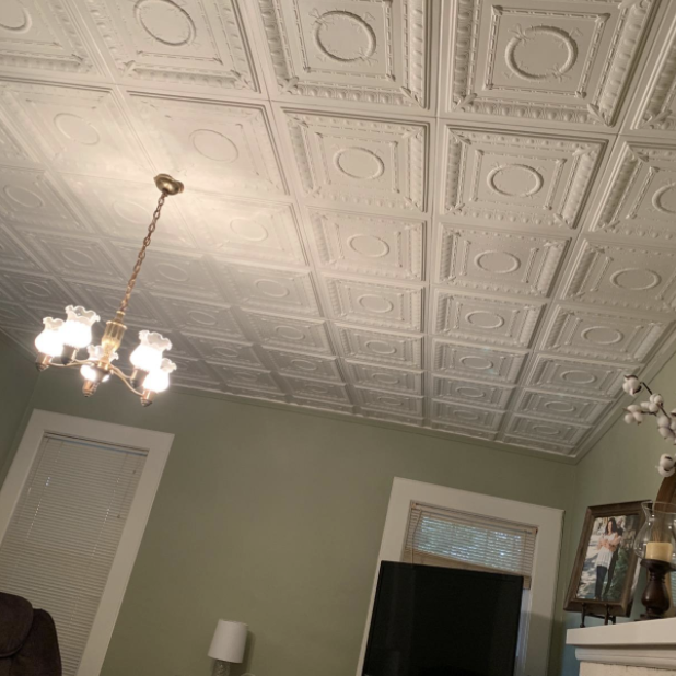 Another reviewer's living room featuring the same ceiling tiles for a stylish look.