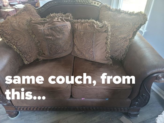 The dull brown couch with a curved back and arms before the makeover.