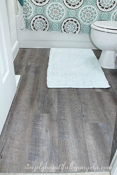 Blogger's bathroom featuring the newly installed flooring.