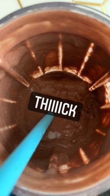 A top-down view of a thick pink smoothie