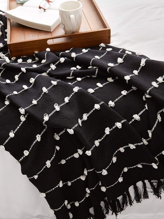 the black throw blanket